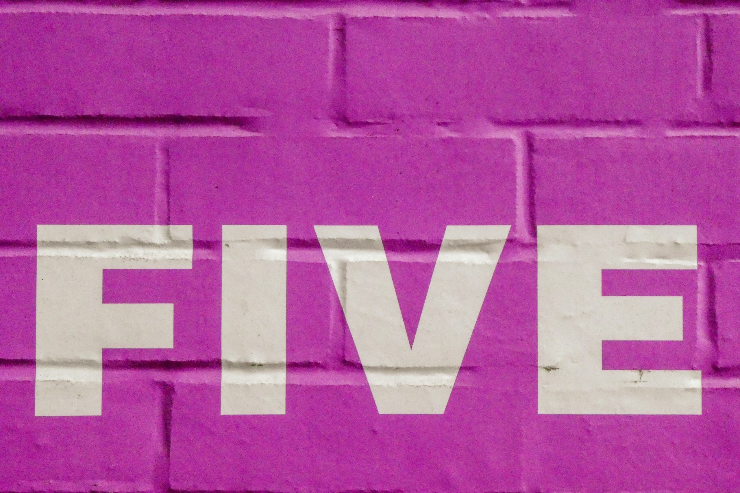 The word five in white letters