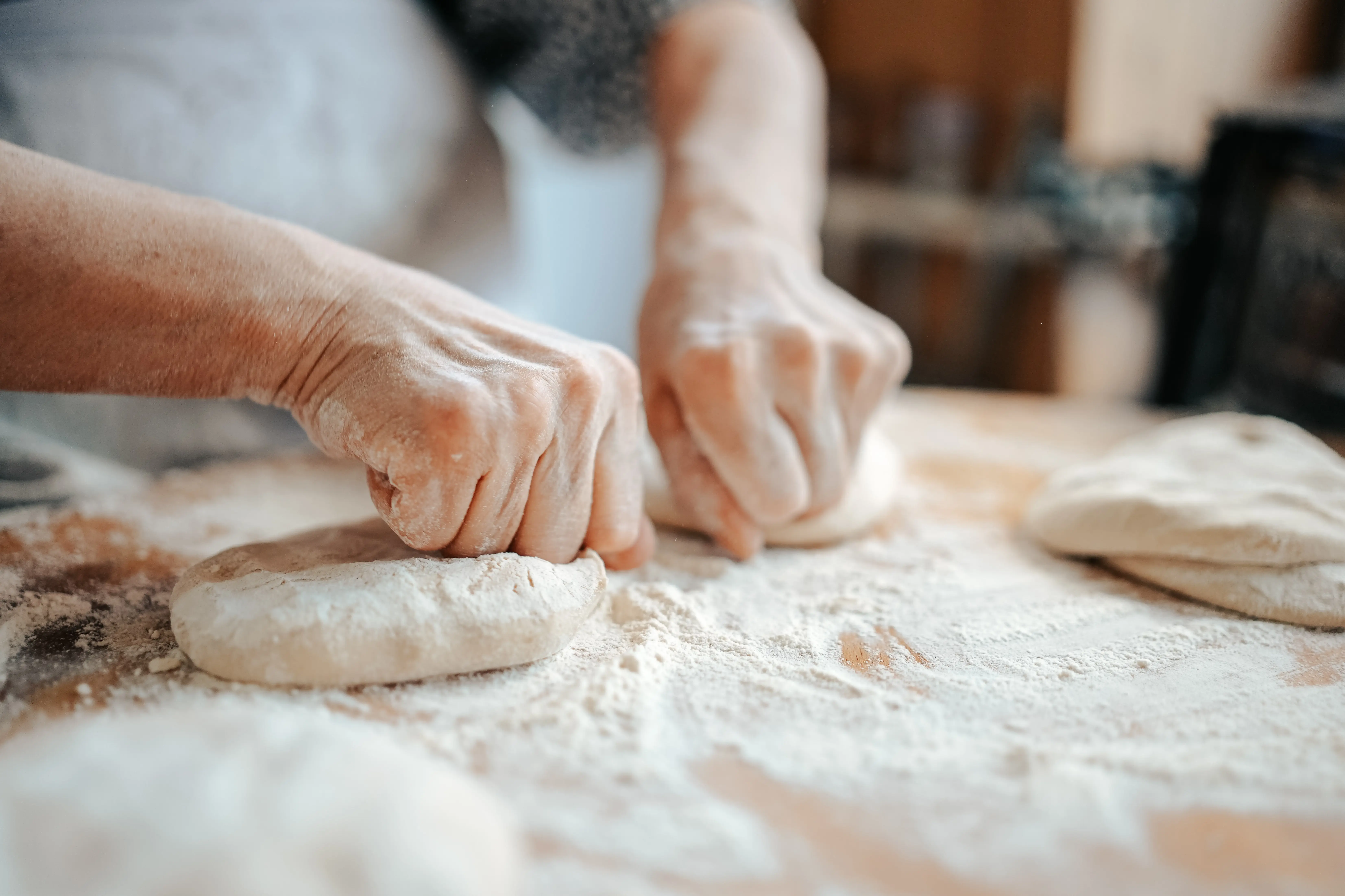 hands making dough