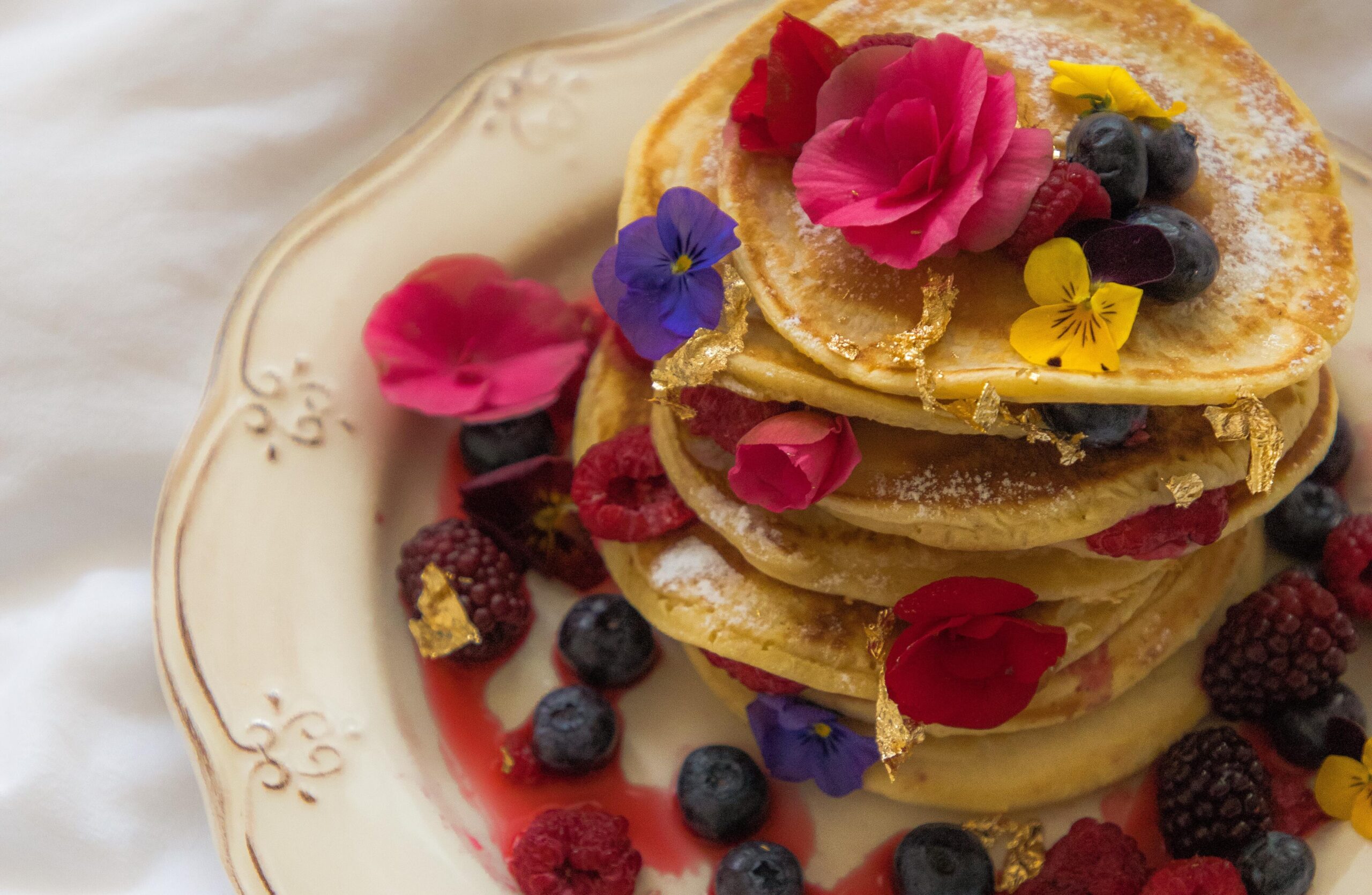 pancakes with different edible flowers